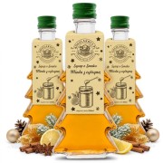 Syrop o smaku miodu z cytryną w gładkiej szklanej butelce choince 250 ml – trzy butelki białe tło